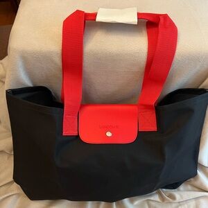 Lancôme Black/Red Handled Tote with Snap Closure
